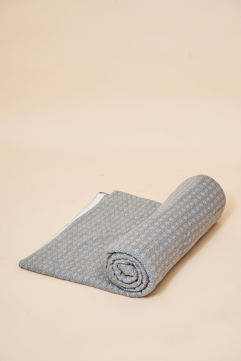 Slate FibreHeat self-heating knit throw blanket, rolled