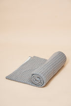 Slate FibreHeat self-heating knit throw blanket, rolled