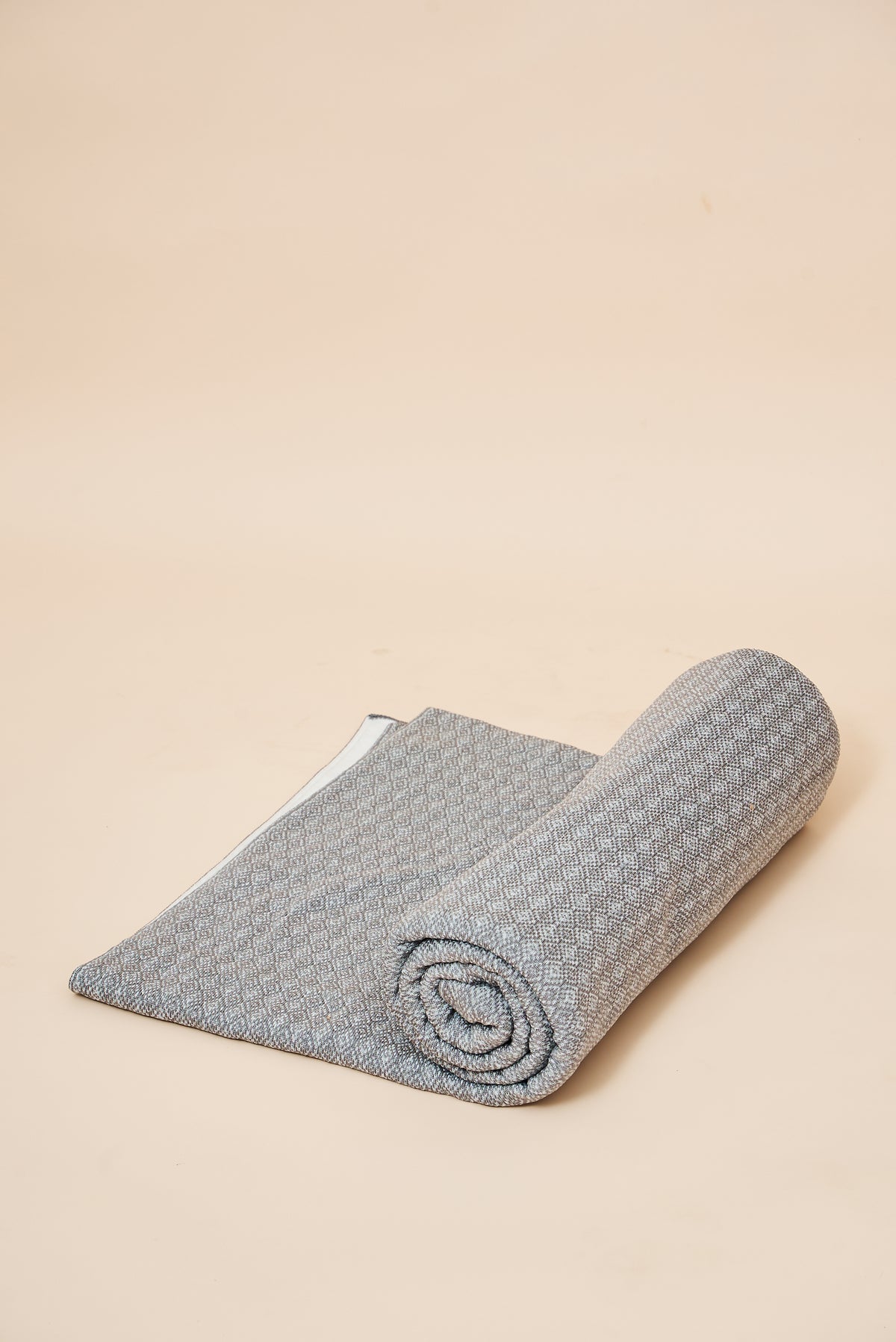Slate FibreHeat self-heating knit throw blanket, rolled