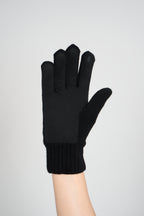 Black merino wool glove with a leather palm patch, palm view