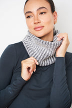 Woman wearing the medium gray and ecru two-tone ribbed wool neck warmer
