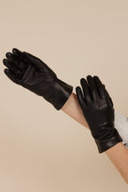 Pair of black women’s self-warming leather gloves