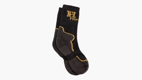 Heavy Winter Sock in black and gold, folded, showing the cushioned sole